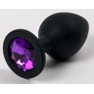 Чёрная анальная втулка с фиолетовым кристаллом - 7,3 см.