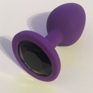 Фиолетовая силиконовая пробка с чёрным кристаллом - 7,3 см.