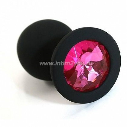 Чёрная силиконовая анальная пробка с ярко-розовым кристаллом - 7 см.