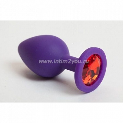 Фиолетовая силиконовая пробка с алым стразом - 7,1 см.