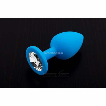 Маленькая голубая силиконовая пробка с прозрачным кристаллом - 7,5 см.