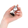 Серебристая анальная пробка с чёрным кристаллом в форме сердца - 7 см.